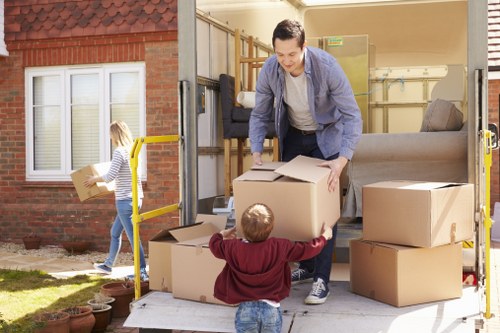 Workers and moving van representing ethical labour standards