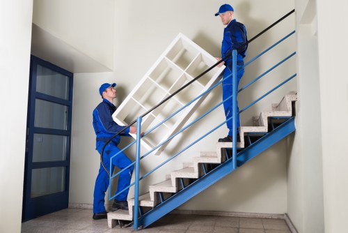 Specialist team moving a piano for a home or business in Ruislip