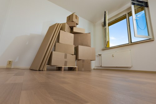 Local moving truck loaded with furniture and boxes for a house relocation