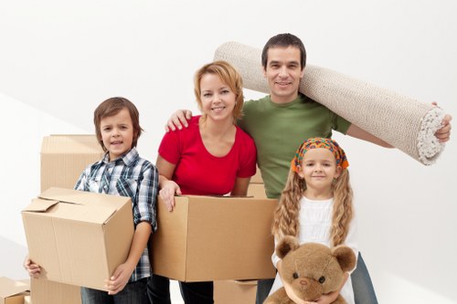 Removal team loading household items with care for a local move