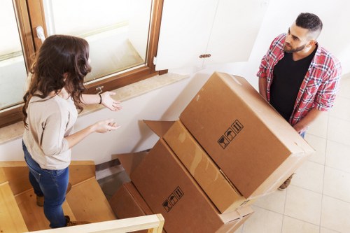 Careful handling of student boxes and electronics during a Ruislip move