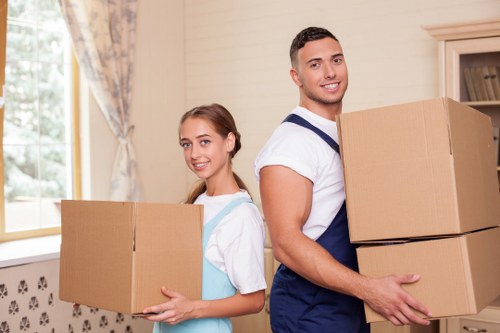 Removal team handling household items during a Ruislip move